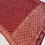 Rajvaari Bandhani Khaddi georgatte Saree – Rich Maroon with Traditional Gold Zari Weave